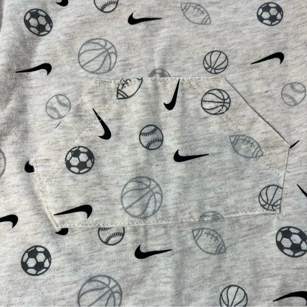 Nike Cream and Black Bodysuit with Short Sleeves and Sports Print